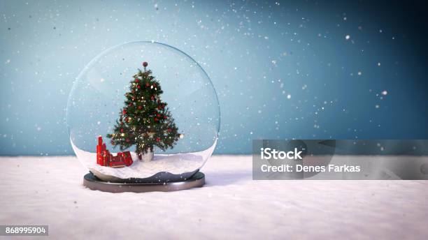 Snowy Ball With A Christmas Tree Inside Stock Image Stock Photo - Download Image Now