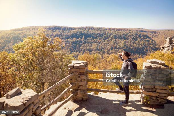 Man Hiking In The Fall Mountains Stock Photo - Download Image Now - Hiking, Man Bun, Men