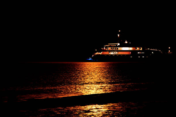A luxury motor boat at night in mykonos, greece