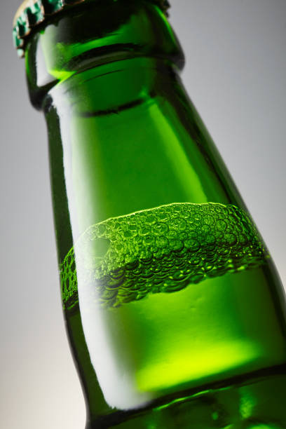 istock Green bottle of beer close-up 869005314