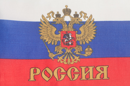 Russian flag with emblem of Russia