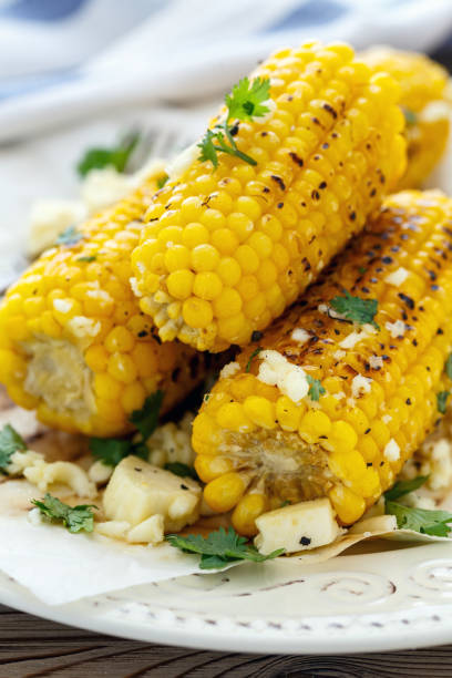 istock Sweet corn grilled with cheese and cilantro. 869008160