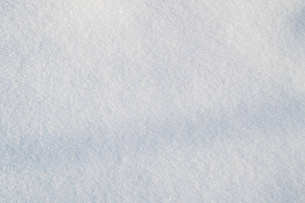 istock background of fresh snow, sparkling in the sun 869008838