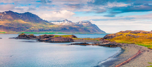 istock Typical Icelandic landscape with volcanic mountains and Atlantic ocean coast 869029726