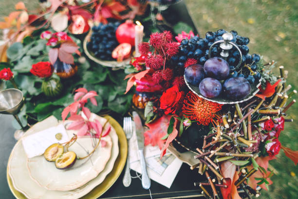 istock The festive wedding table with red autumn leaves. Wedding decoration. Artwork 869042056