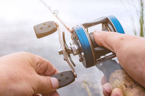 istock Man is fishing with a backcasting reel 869045638