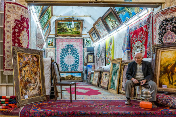 Bazar-e Bozorg.One of Iran’s most historic and fascinating bazaars, this sprawling covered market links Naqsh-e Jahan (Imam) Sq with the Masjed-e Jameh. At its busiest in the mornings, the bazaar’s arched passageways are topped by a series of small per stock photo