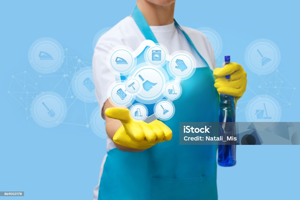 Cleaning lady shows cleaning services . Cleaning lady shows cleaning services and work at home. Cleaning Stock Photo