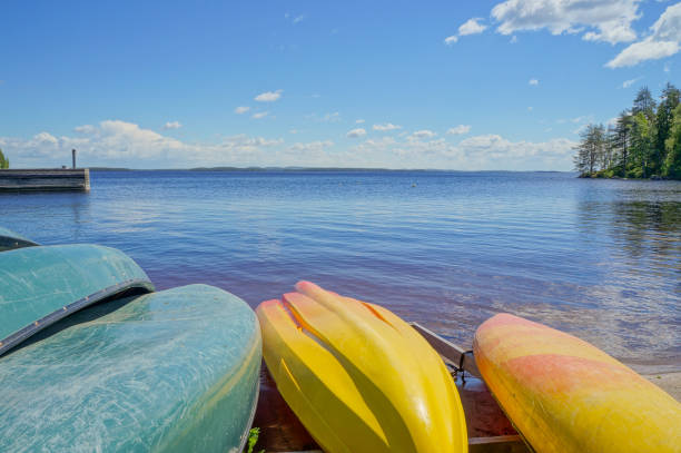 istock Colorful Kayaks on Lake Shore 869069064