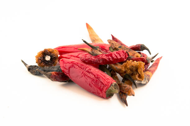 istock Dried chilli pepper isolated on white background cutout 869077404