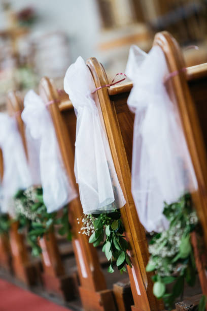 istock Church pew flowers 869080828