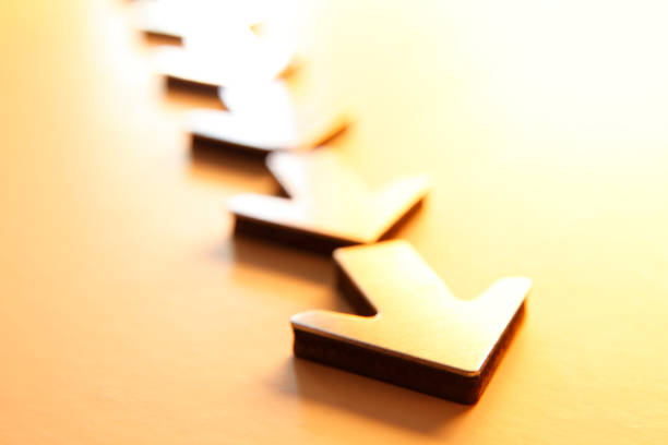 istock Row Of Arrows Pointing In The Same Direction Towards The Camera 869081054