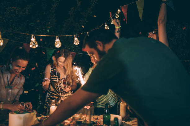 istock Friends enjoying at backyard party 869081180