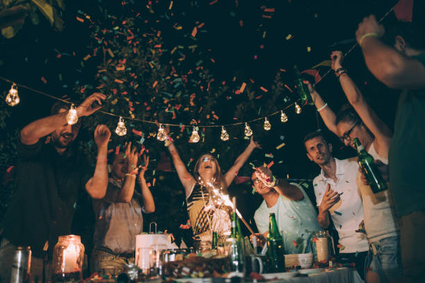 istock Friends having fun at b-day party 869084270
