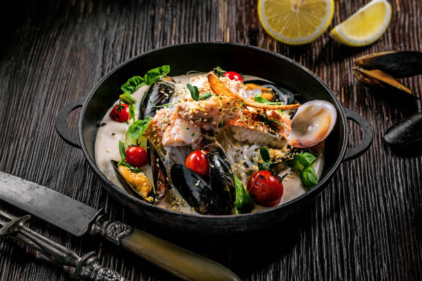 istock Bass fish and seafood with rice noodles 869084896
