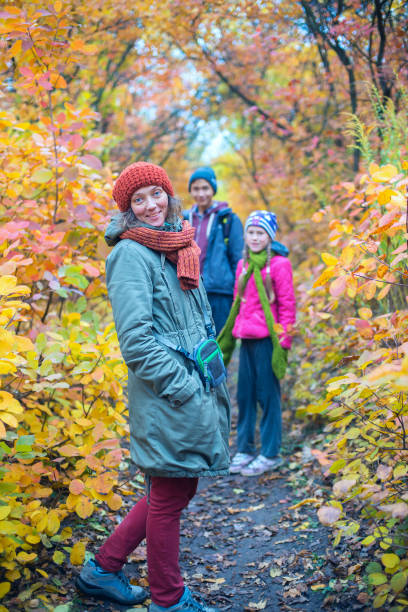 istock Happy family on a walk 869085204
