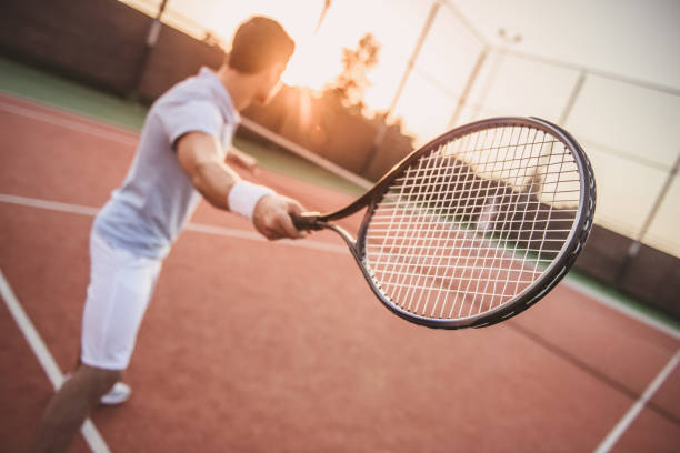 istock Couple playing tennis 869085652