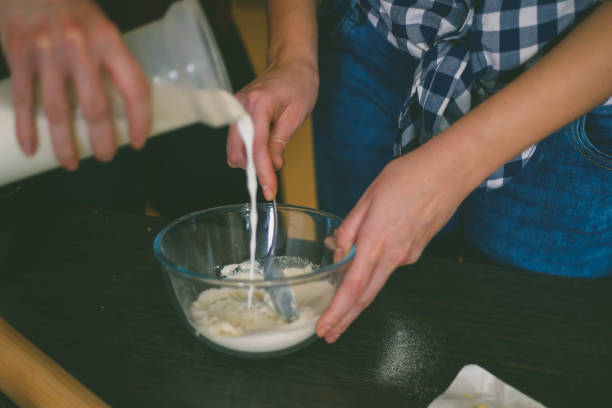 istock Young woman in the kitchen 869086132