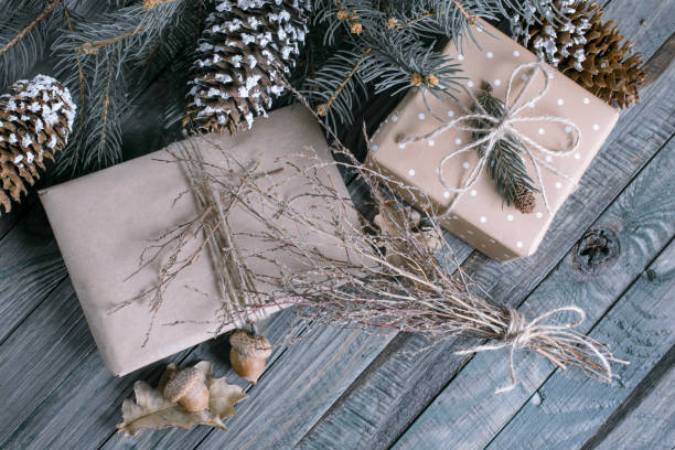 istock Christmas background with gift box on wooden planks 869092524