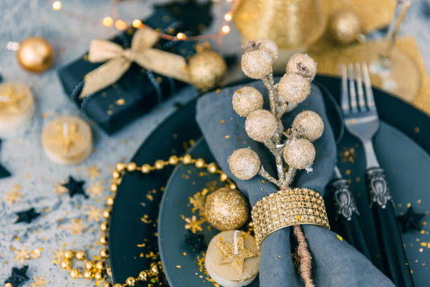 Christmas table setting with gift stock photo