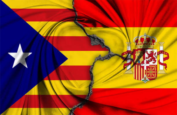 istock Spain flag and Catalan Estelada Flag 869102988