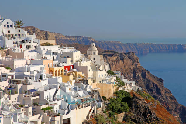 istock Santorini in Greece with blue sky 869115736