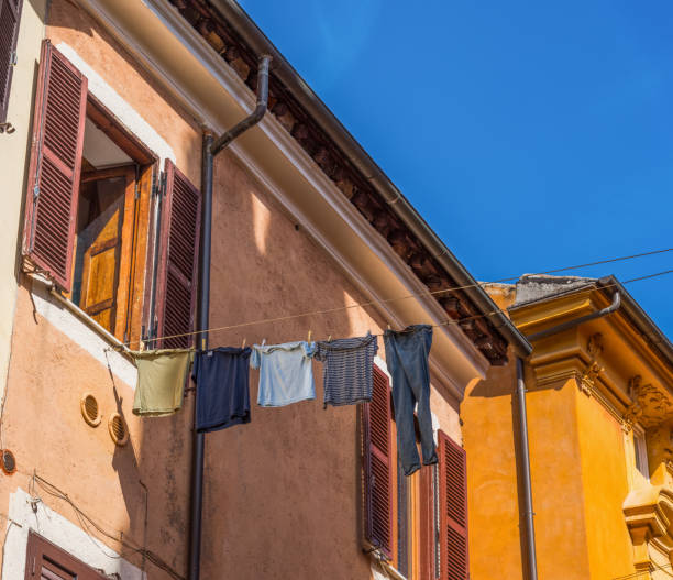 istock Clothes line and old buuildings 869119110