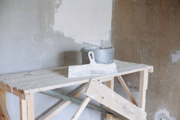 istock Set of plaster trowel tool, spatula and bucket. 869122688