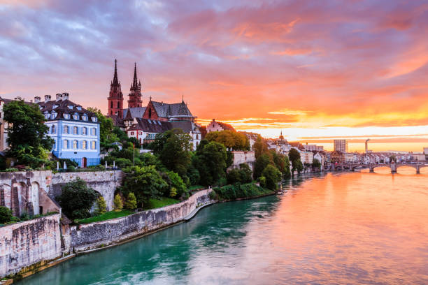 Basel, Switzerland. Basel, Switzerland.  Old town with Munster cathedral on the Rhine river at sunset. switzerland stock pictures, royalty-free photos & images