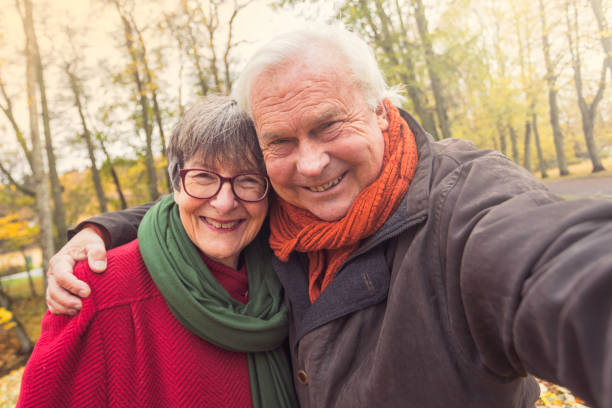 istock Senior couple taking a selfie 869128550