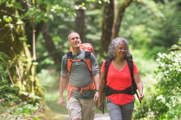 istock Senior couple hike in the forest 869148504