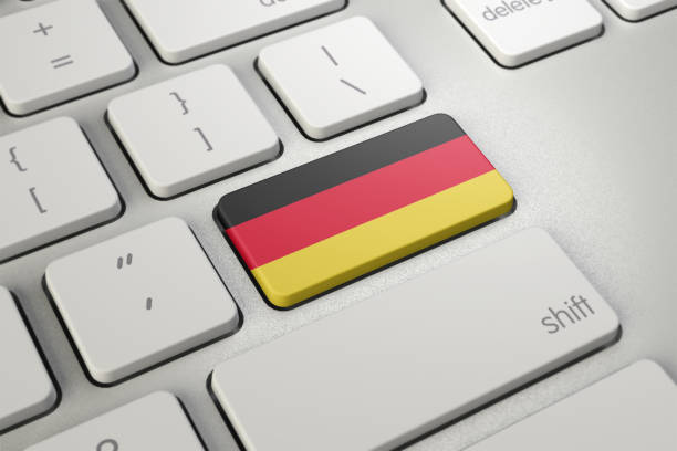 Germany flag on keyboard key germany technology german language photos stock pictures, royalty-free photos & images