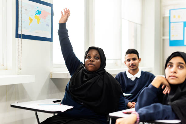 istock Diverse Muslim children studying in a classroom 869171382