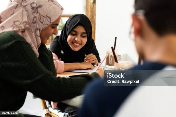 A Group Of Muslim Students Stock Photo - Download Image Now - Education, Dubai, Arabia