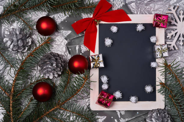 istock Christmas background with decorations and ornaments on wooden board 869175096