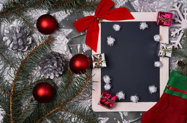 istock Christmas background with decorations and ornaments on wooden board 869175138