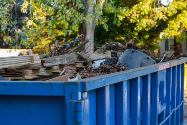 istock Industrial dumpster filled with debris. 869178288