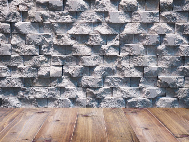istock Wooden floor over geometric rectangular marble stone wall for display the products. 869181910