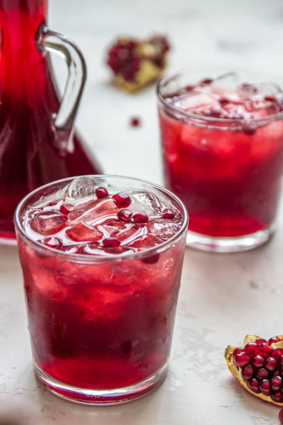 istock Pomegranat juice with ice and fruit slices 869185622