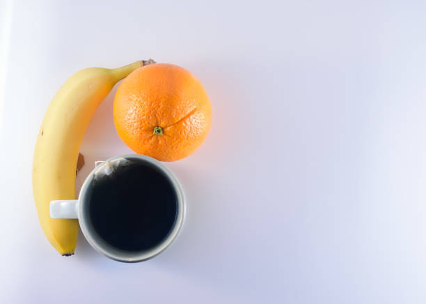 istock Tea, banana, and orange 869195350