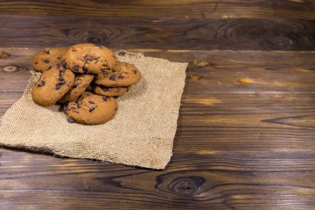 istock Chocolate chip cookies on wooden table 869199086