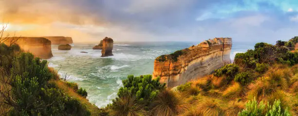 Razorblade cut off limestone rock of Great Ocean road twelve apostles marine park in Victoria. Colourful sunrise over apostles coast.