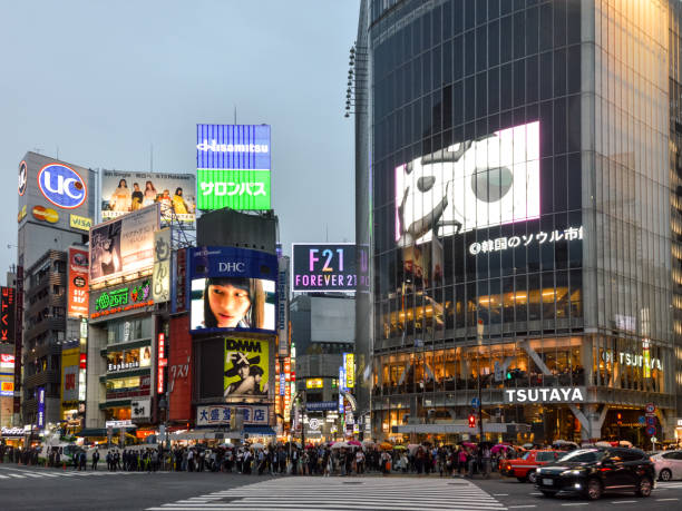 istock Tokyo Shibuya Crossing at night during rain 869202826