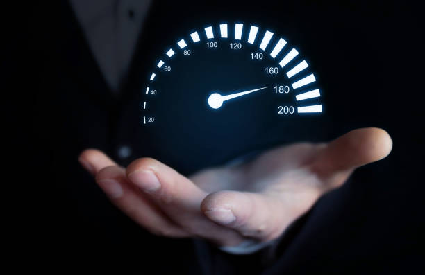 istock Man holding car speedometer. Speed concept. 869206562