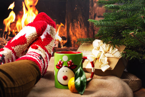 istock Cozy holiday evening near a fireplace 869210936