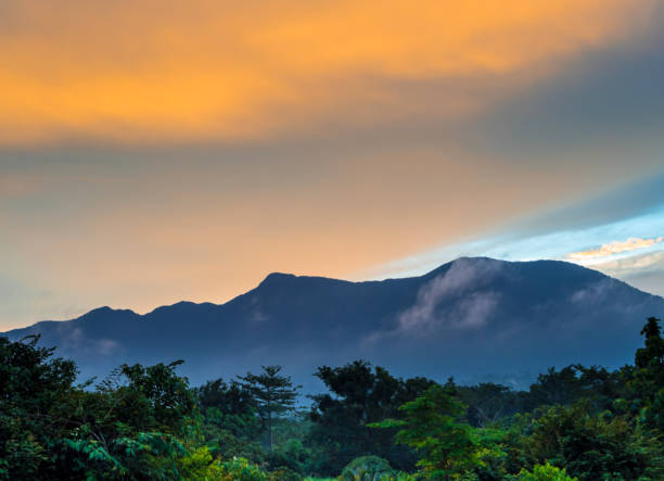 istock Colorful Sky and Clouds drifting over the forest mountain in evening time 869211208