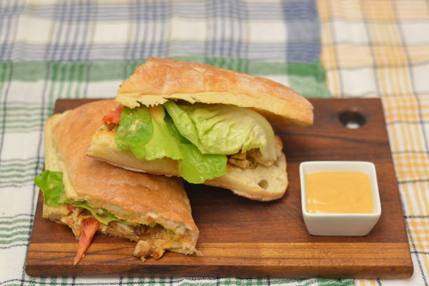 istock Meat Sandwich on cutting board 869222770
