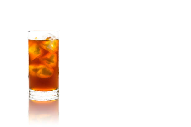 Coffee clod brew process (Method). Full glass of cold black coffee with reflection and copy free text space. Isolated on white background with clipping path.
