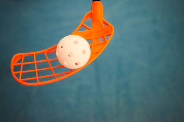 Floorball stick and ball. Focused to blade