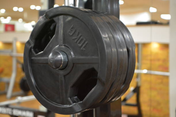 istock Weight Plates in a Gym 869226390